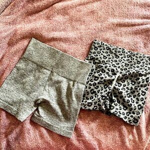 2 pairs grey shorts.